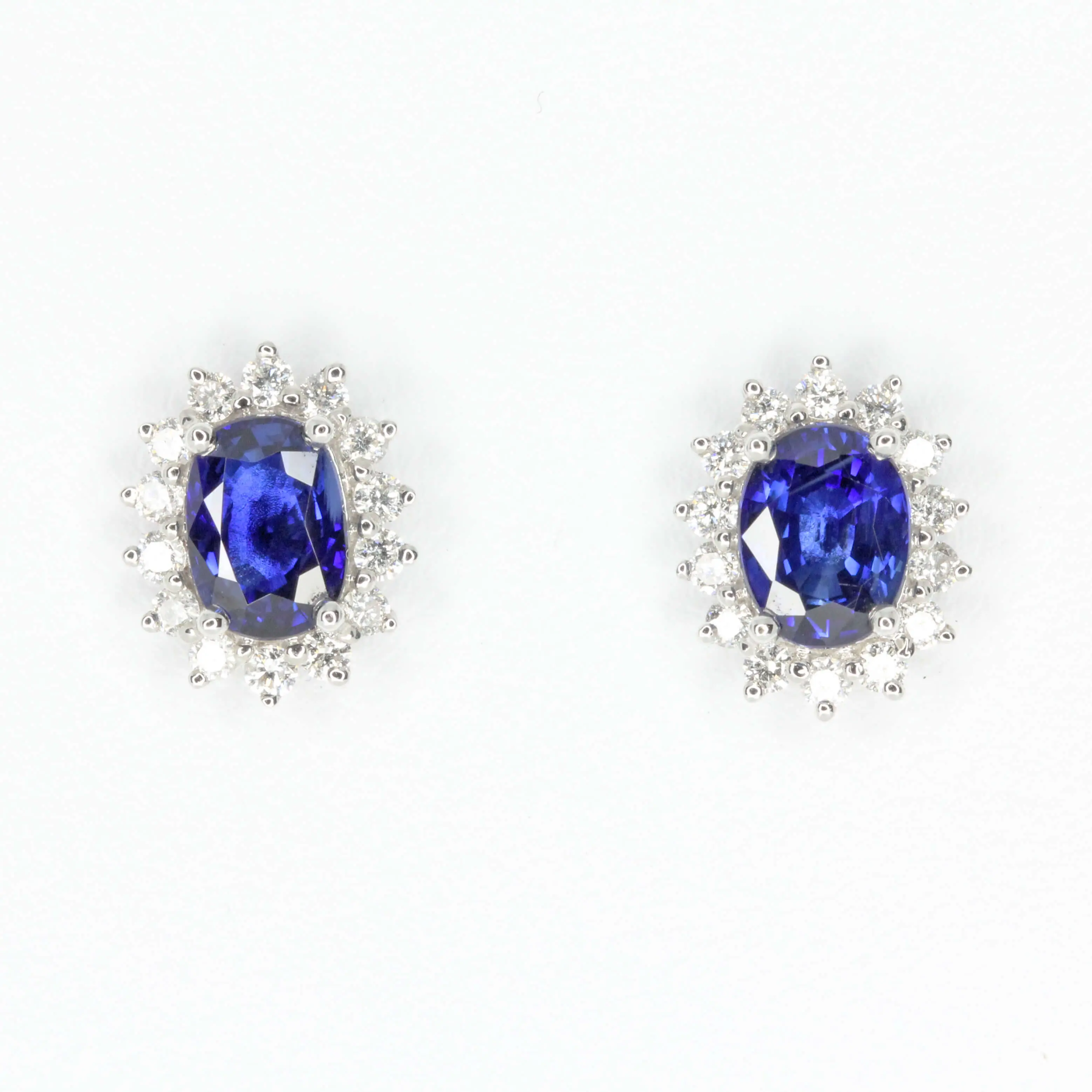 Oval Sapphire Earrings with Halo of Diamond set in 18ct White Gold