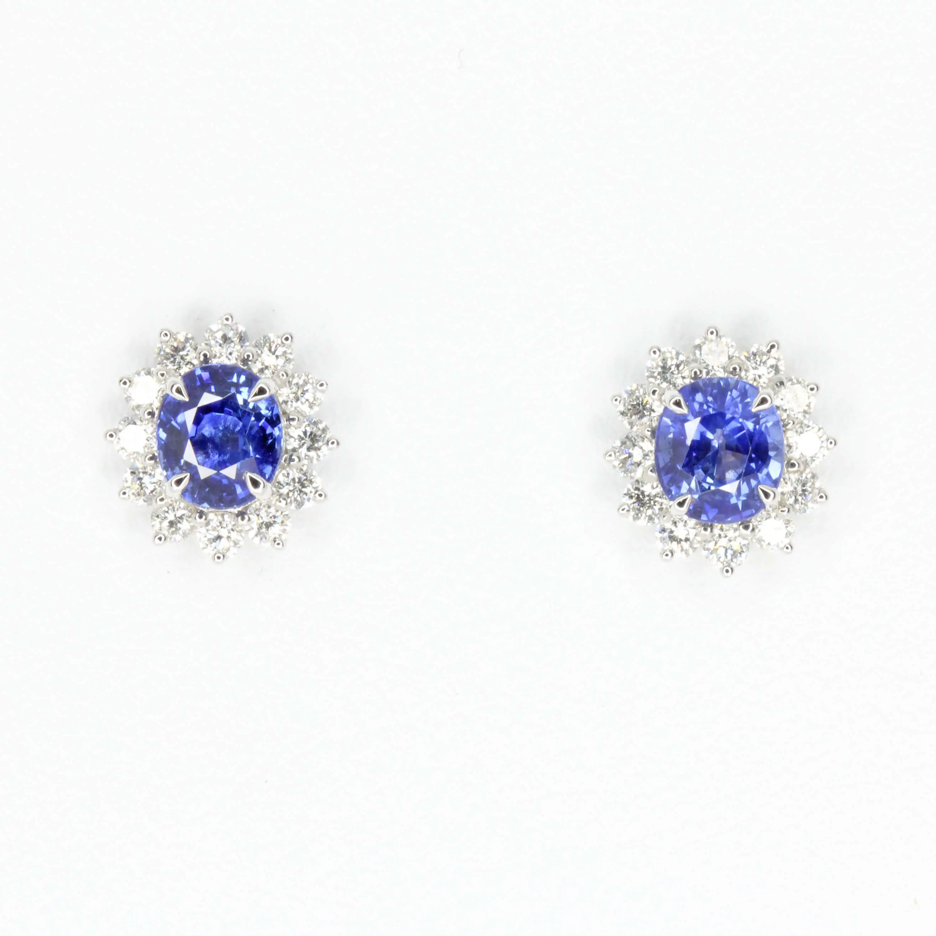 Oval Sapphire Earrings with Halo of Diamond set in 18ct White Gold
