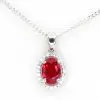 Oval Ruby Pendant with Halo of Diamonds set in 18ct White Gold