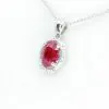 Oval Ruby Pendant with Halo of Diamonds set in 18ct White Gold