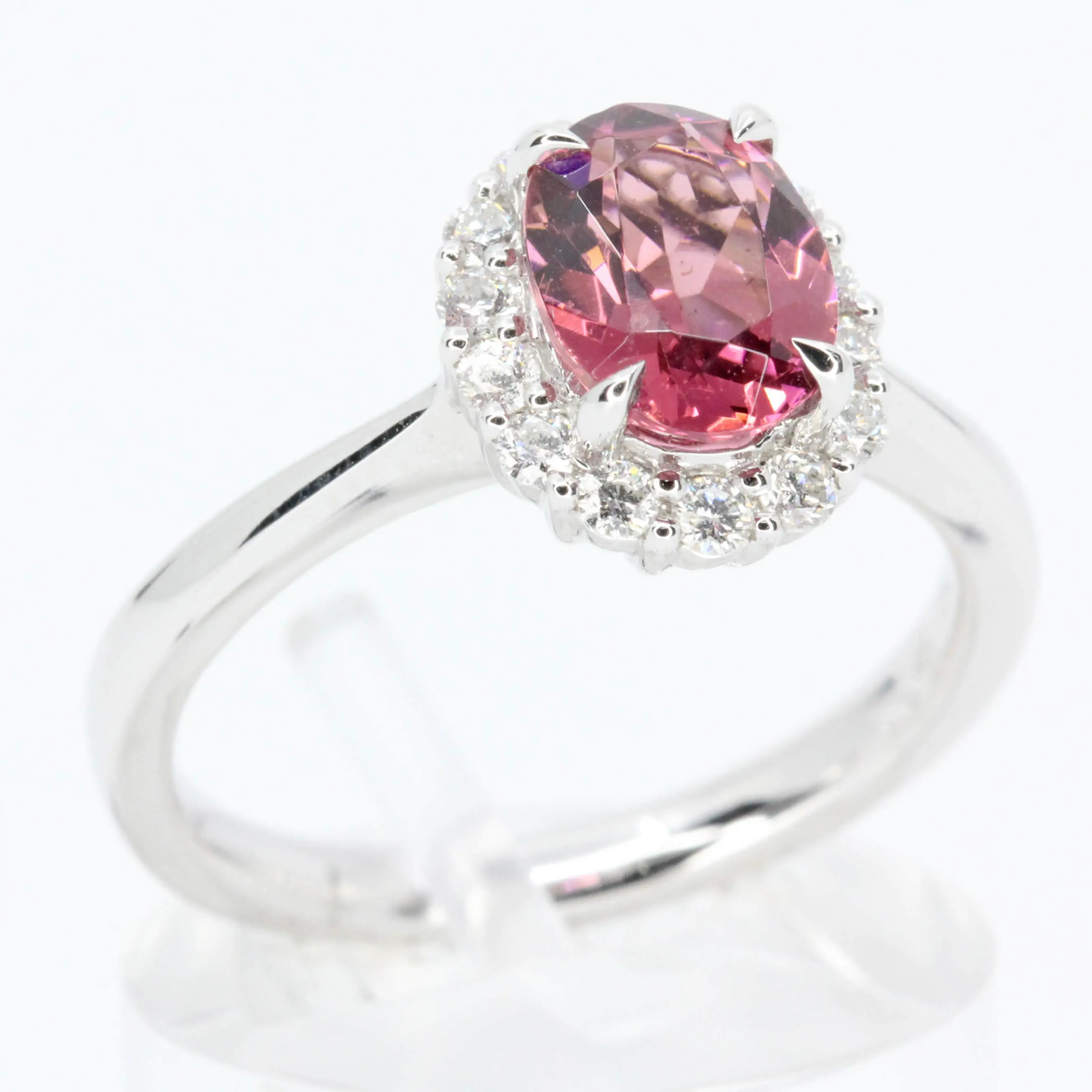 Oval Shape Pink Tourmaline Ring with Halo of Diamonds Set in 18ct White Gold