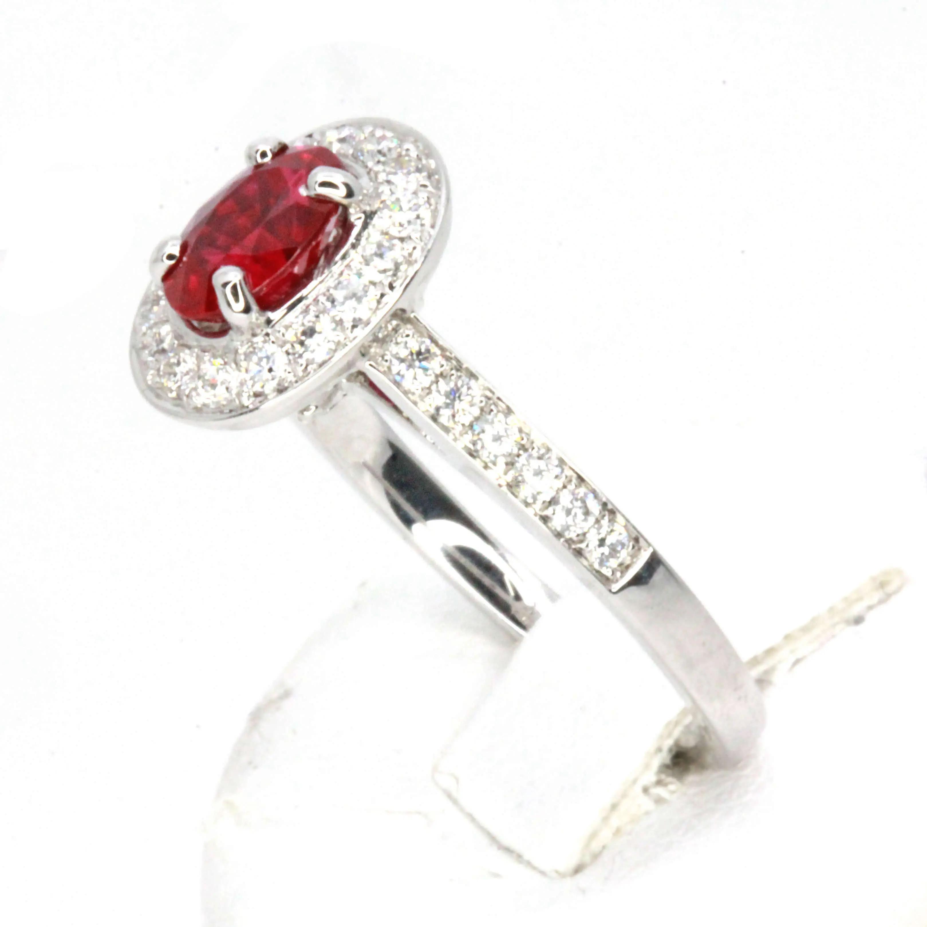 Oval Cut Ruby Ring with Accents of Diamonds Set in 18ct White Gold