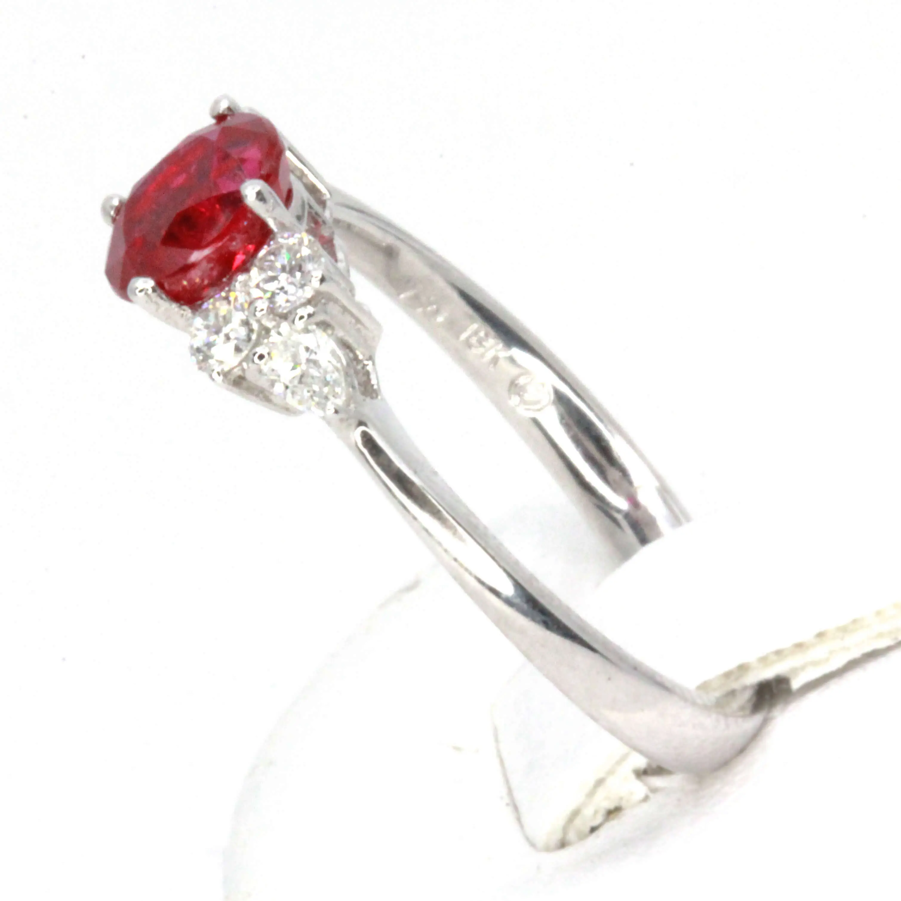 Oval Shape Ruby Ring with Accents of Diamonds Set in 18ct White Gold