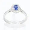 Oval Shape Sapphire Ring with Diamond Halo Set in 18ct White Gold