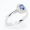 Oval Shape Sapphire Ring with Diamond Halo Set in 18ct White Gold
