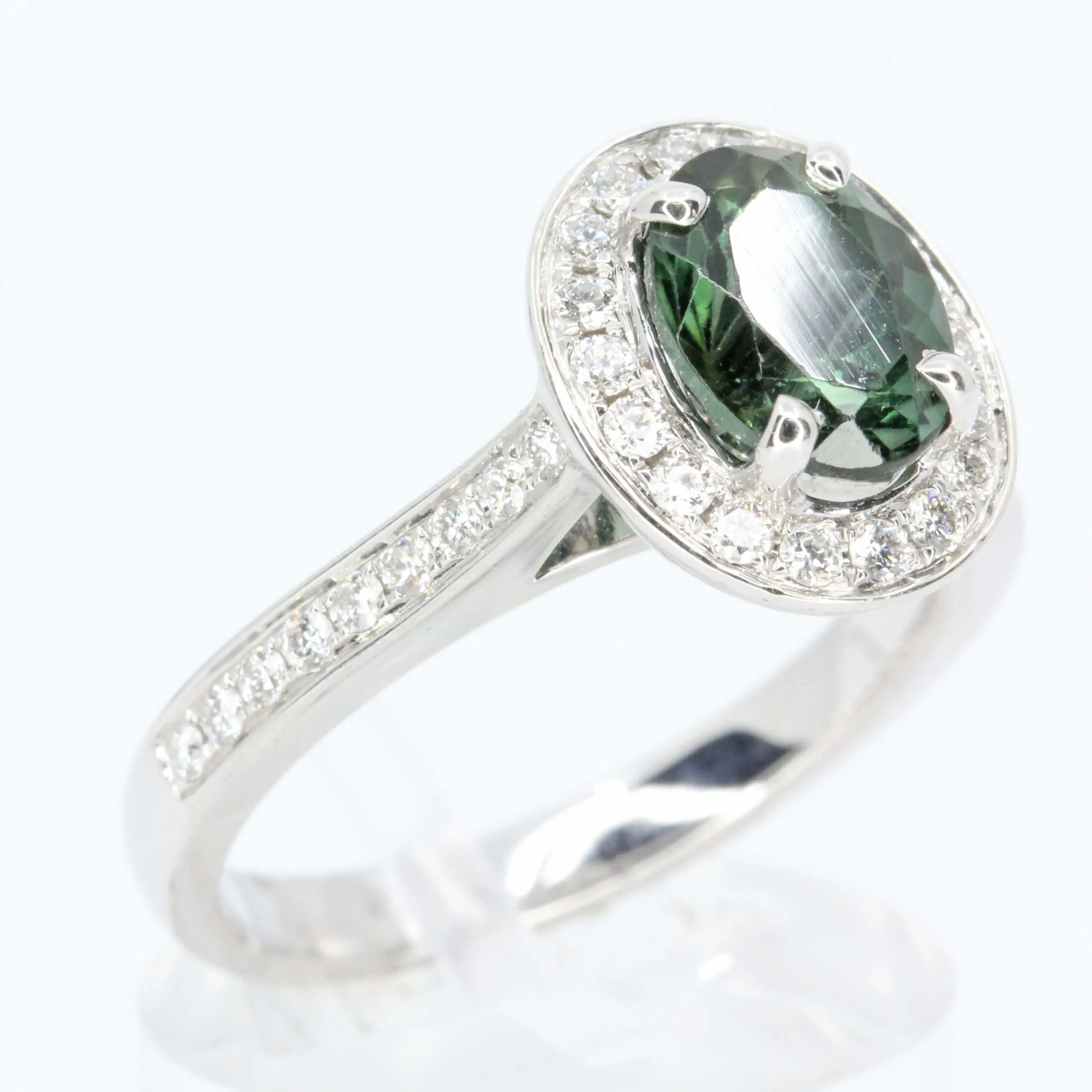 Oval Shape Green Tourmaline Ring with Accents of Diamonds Set in 18ct White Gold
