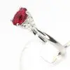 Oval Shape Ruby Ring with Accents of Diamonds Set in 18ct White Gold