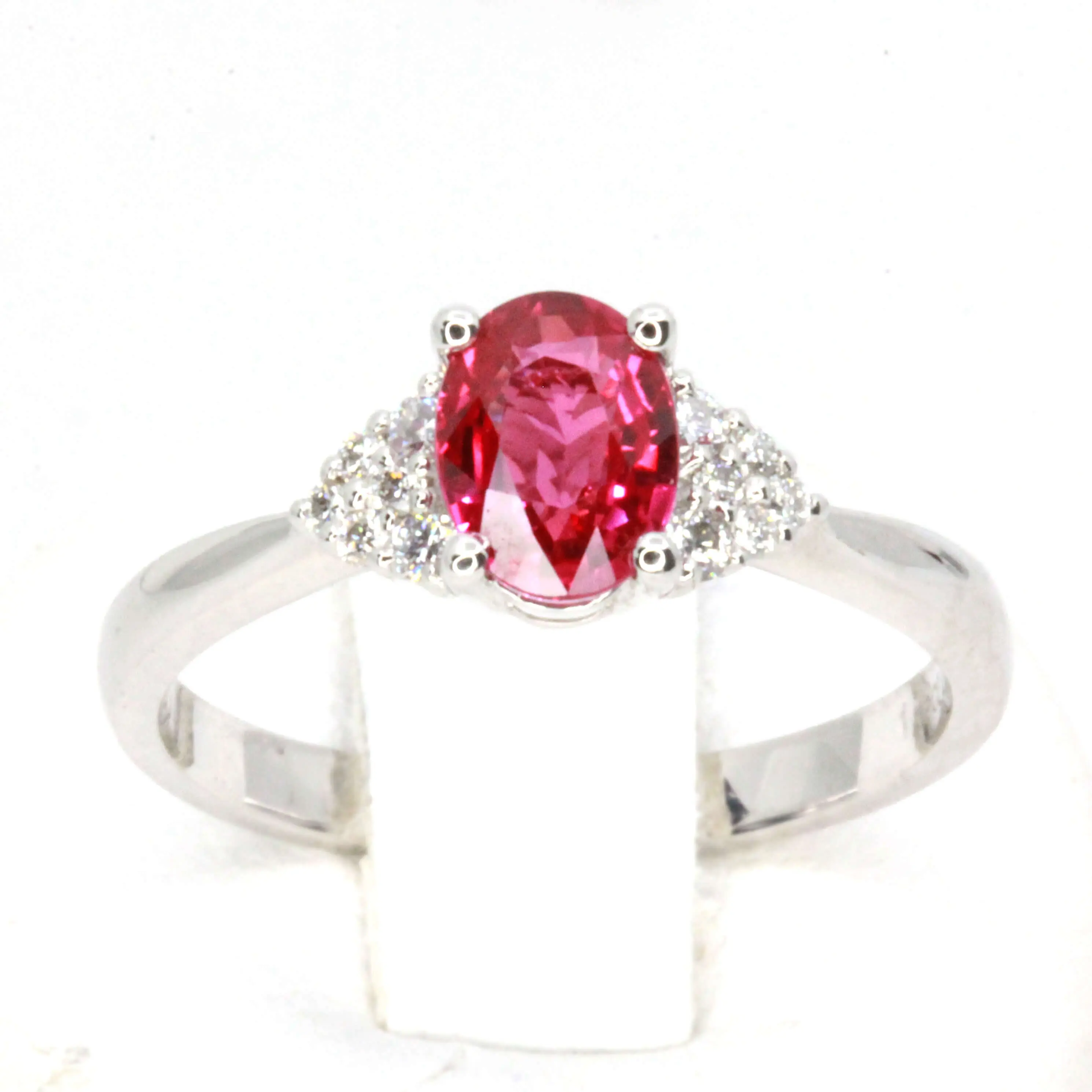 Oval Shape Ruby Ring with Accents of Diamonds Set in 18ct White Gold