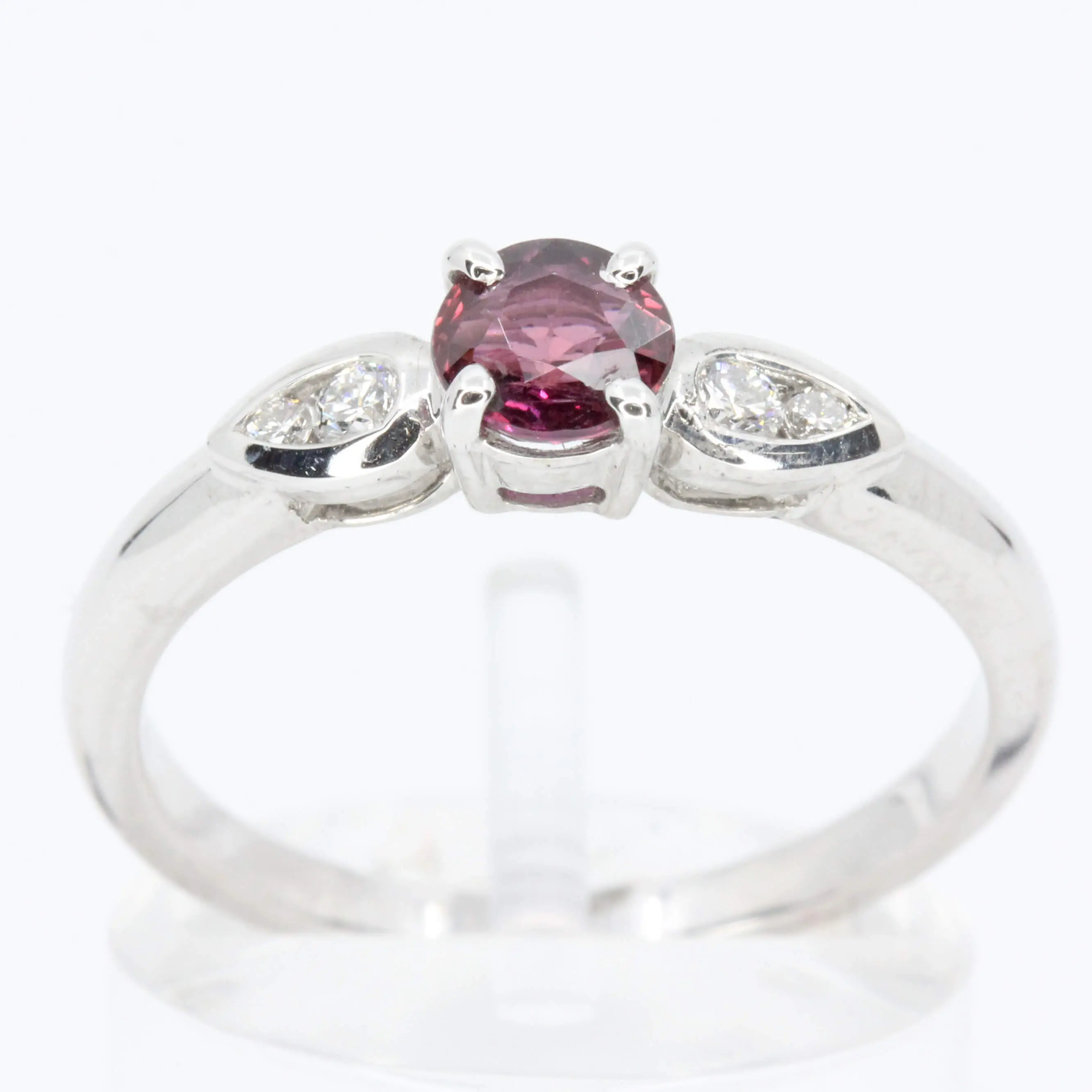 Round Cut Ruby Ring with Accents of Diamonds Set in 18ct White Gold