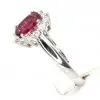 Oval Shape Ruby Ring with Halo of Diamonds Set in 18ct White Gold