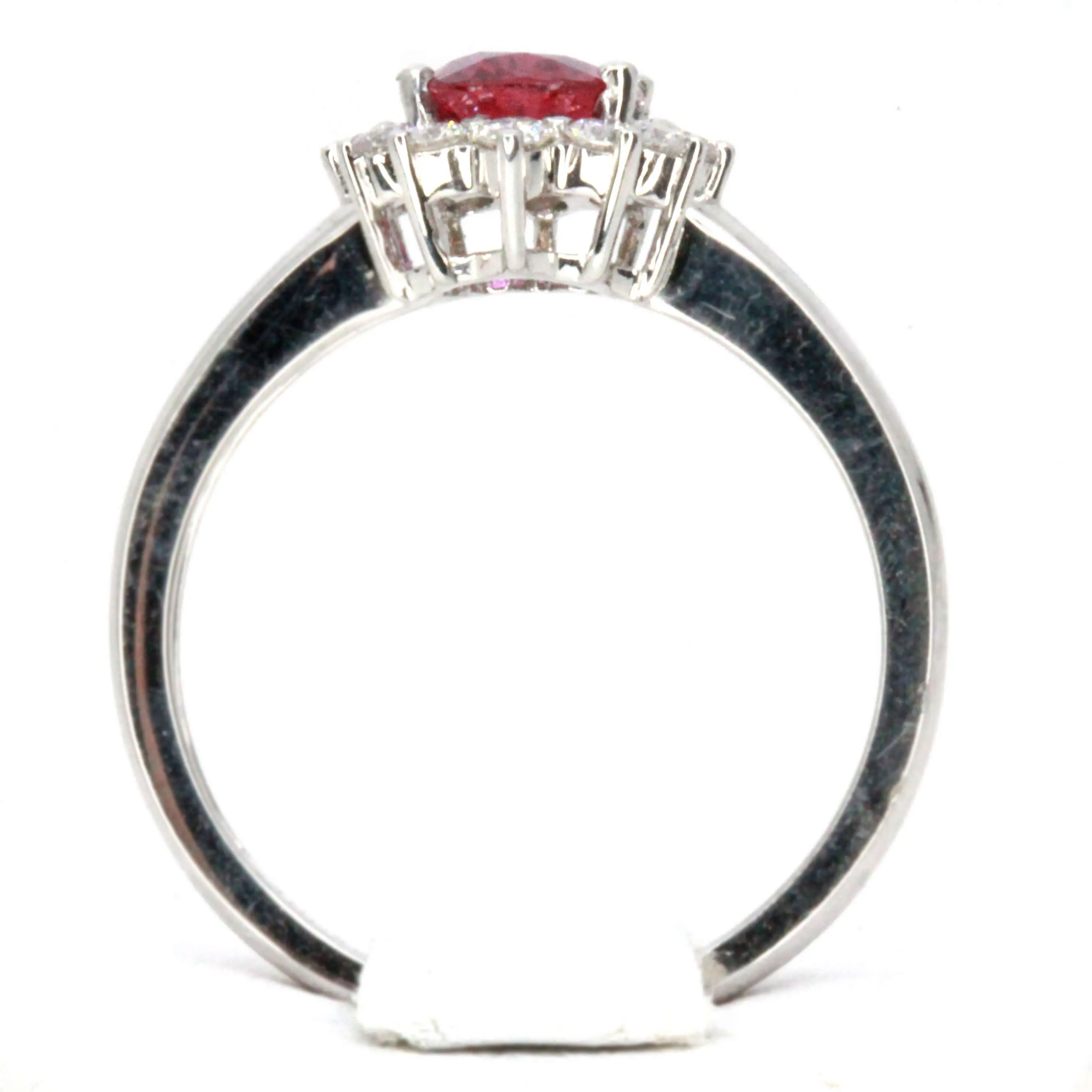 Oval Shape Ruby Ring with Halo of Diamonds Set in 18ct White Gold