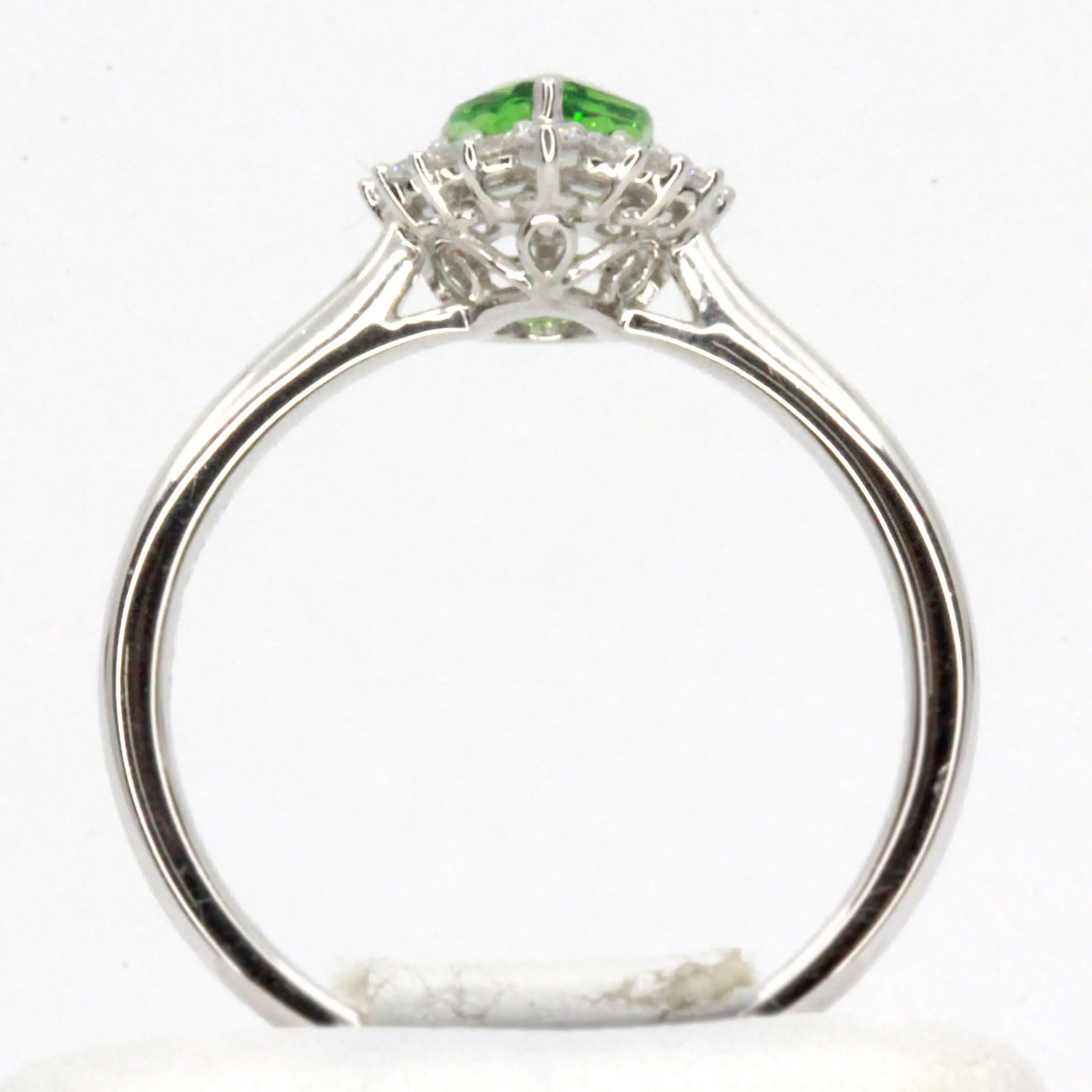 Pear Cut Tsavorite Ring with Halo of Diamonds Set in 18ct White Gold
