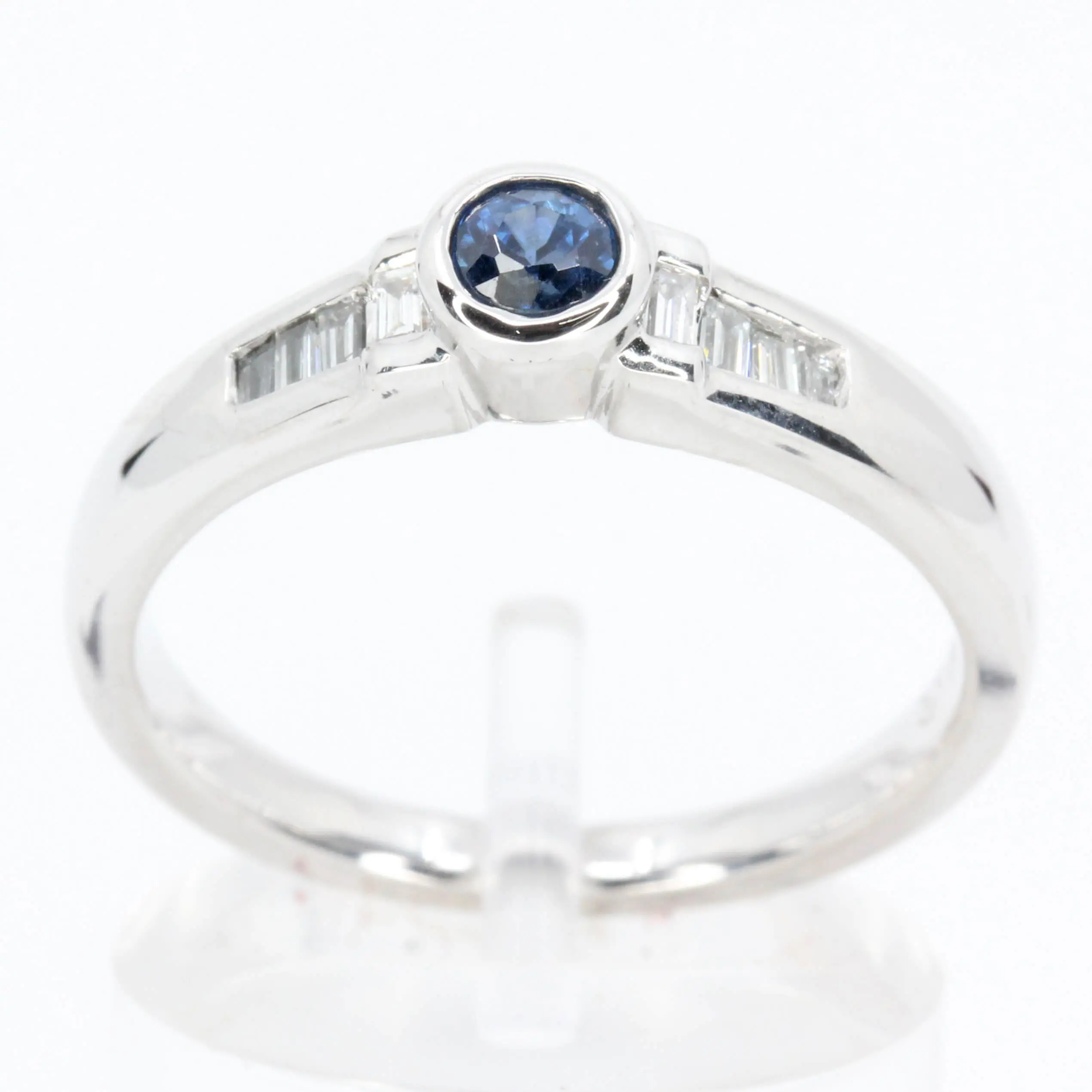 Round Cut Solitaire Australian Sapphire Ting with Accents of Diamonds Set in 18ct White Gold