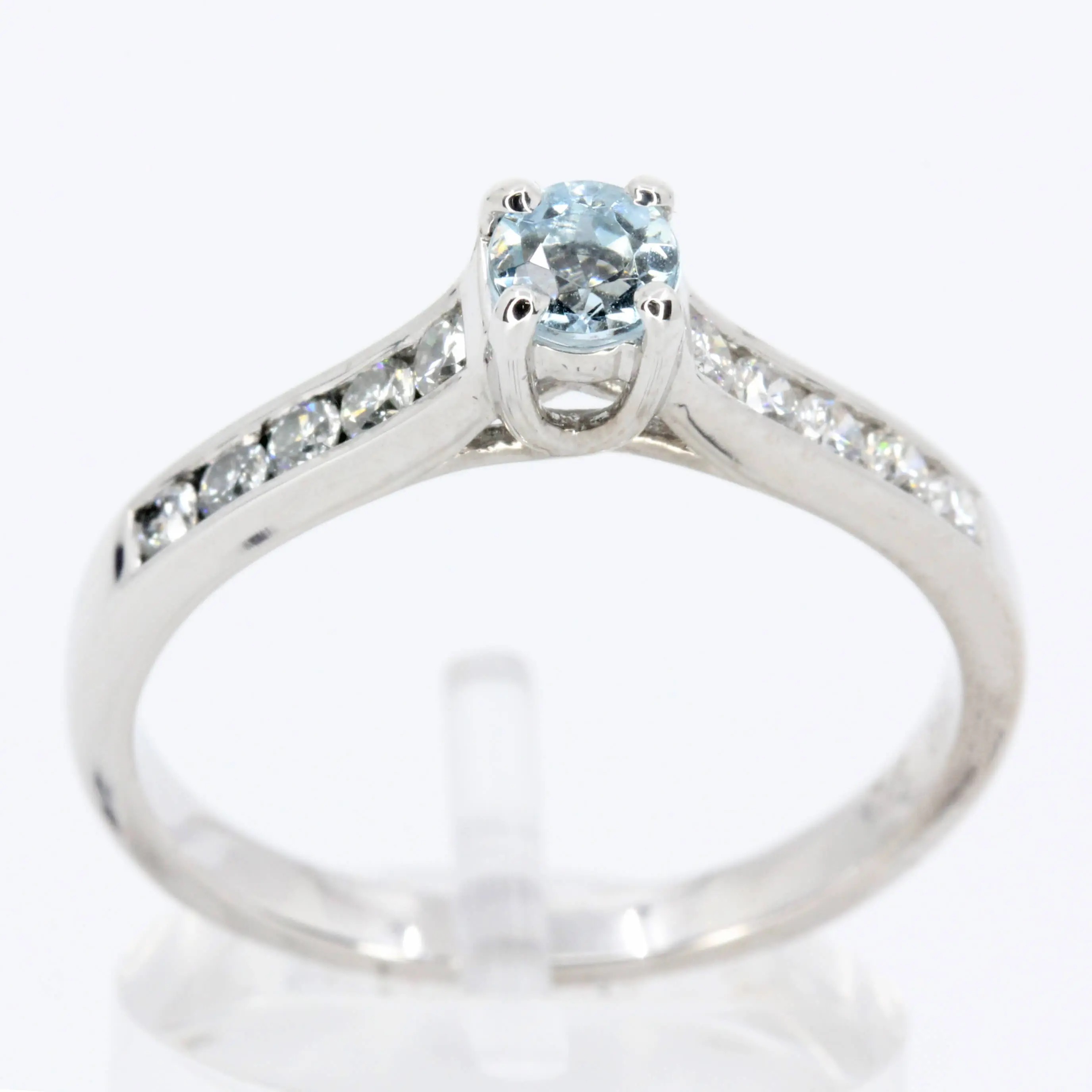Round Cut Aquamarine Ring with Accents of Diamonds Set in 18ct White Gold