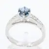 Round Cut Aquamarine Ring with Accents of Diamonds Set in 18ct White Gold