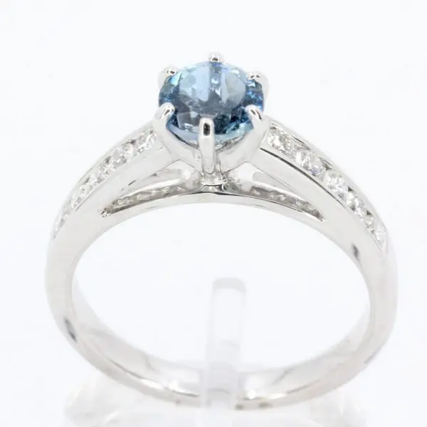Round Cut Aquamarine Ring with Accents of Diamonds Set in 18ct White Gold