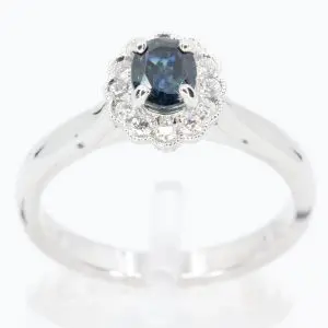 Oval Shape Australian Sapphire Ring with Grain of Diamonds Set in 18ct White Gold