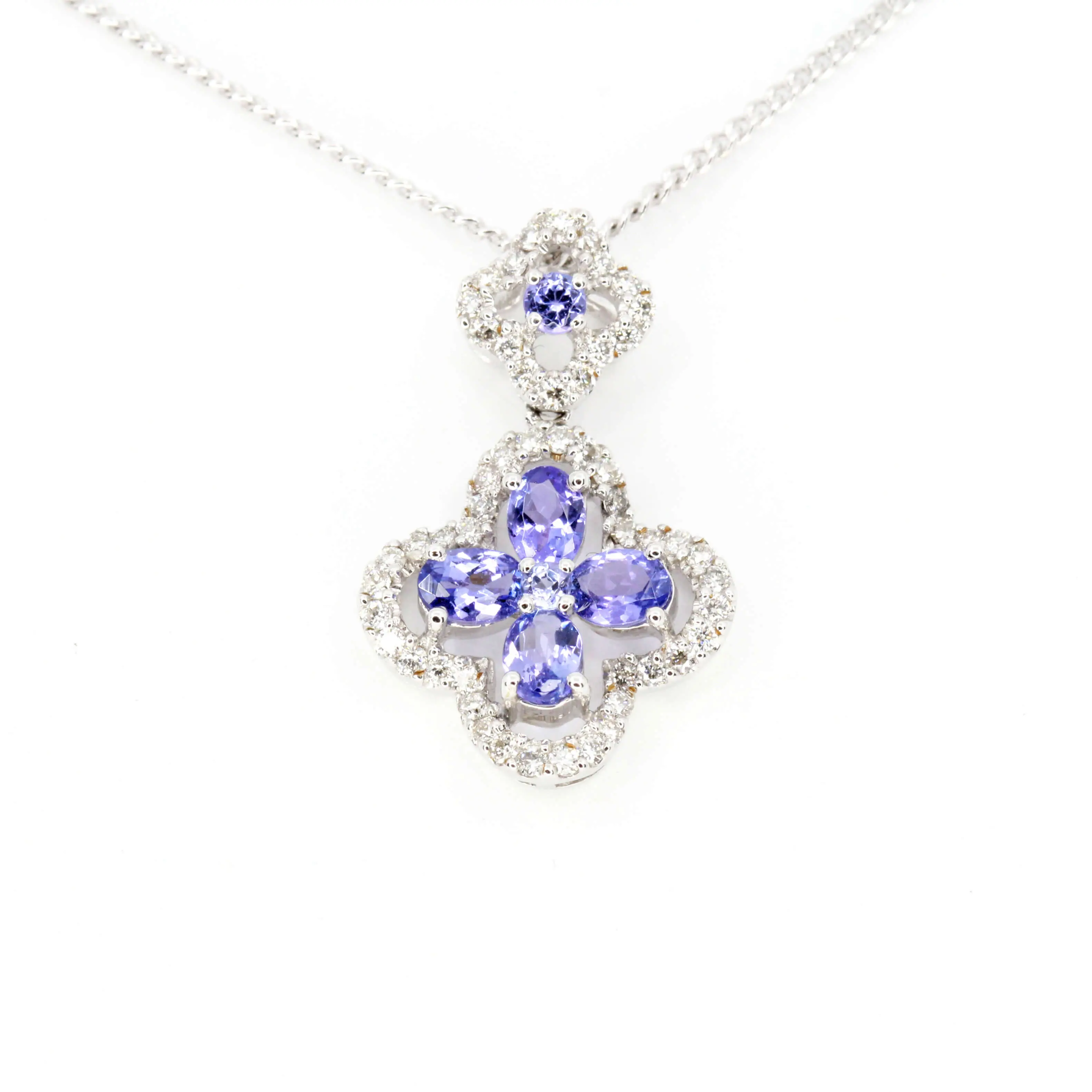 Oval Tanzanite Pendant with Halo of Diamonds set in 18ct White Gold