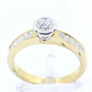 Round Brilliant Cut Diamond Ring with Channel Set Diamonds Accents set in 18ct Two Tone Gold