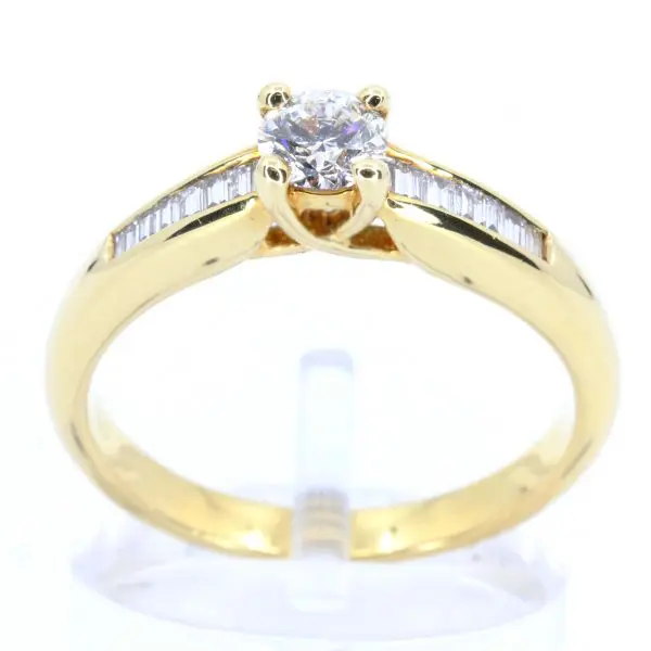 Round Brilliant Cut Diamond Ring with Channel Set Diamonds Accents set in 18ct Yellow Gold