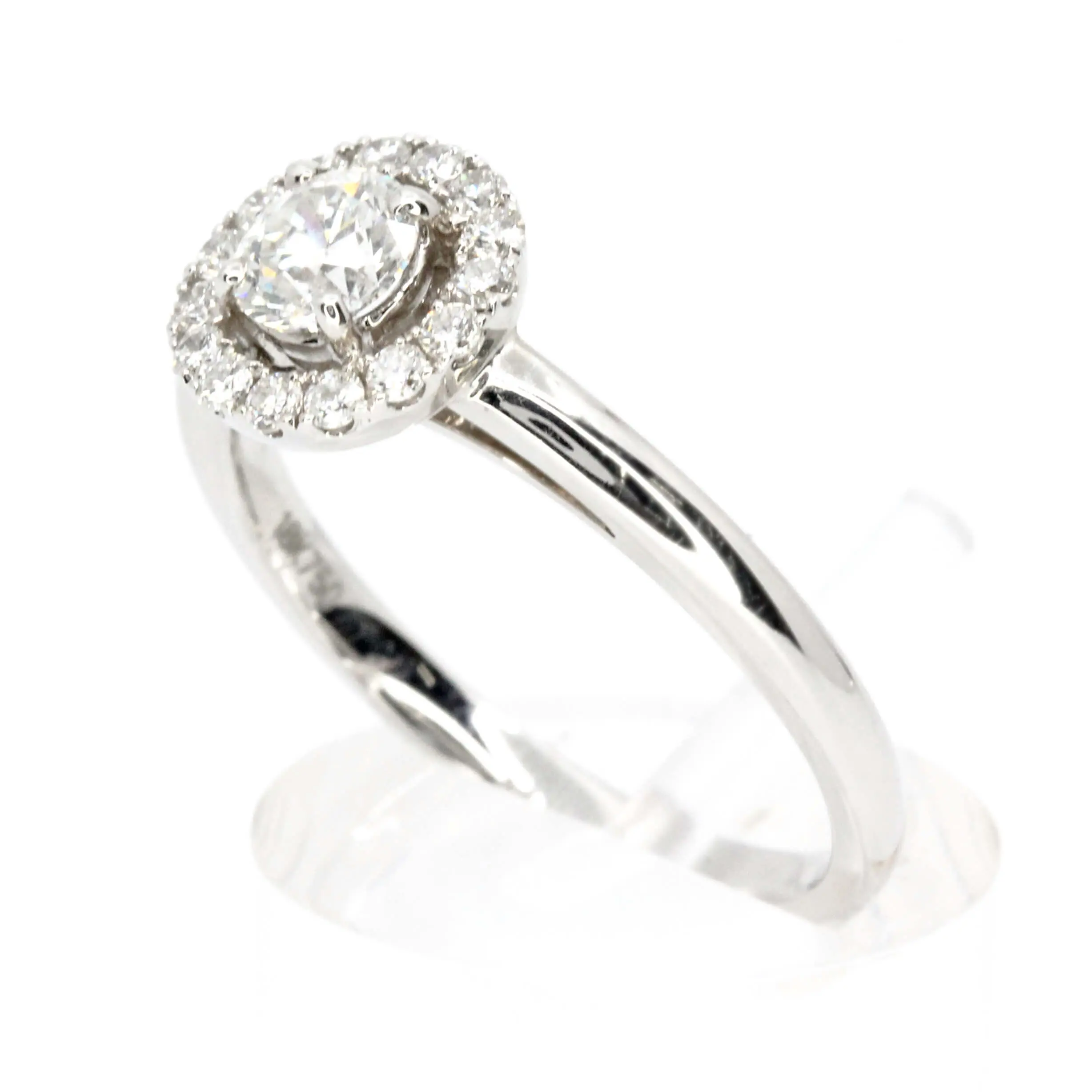 Round Brilliant Cut Diamond Ring with Halo of Diamonds set in 18ct White Gold