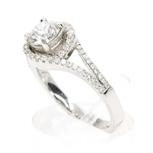 Round Brilliant Cut Diamond Ring with Halo of Diamonds set in 18ct White Gold