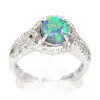 Claw Set Black Opal with Halo of Diamonds