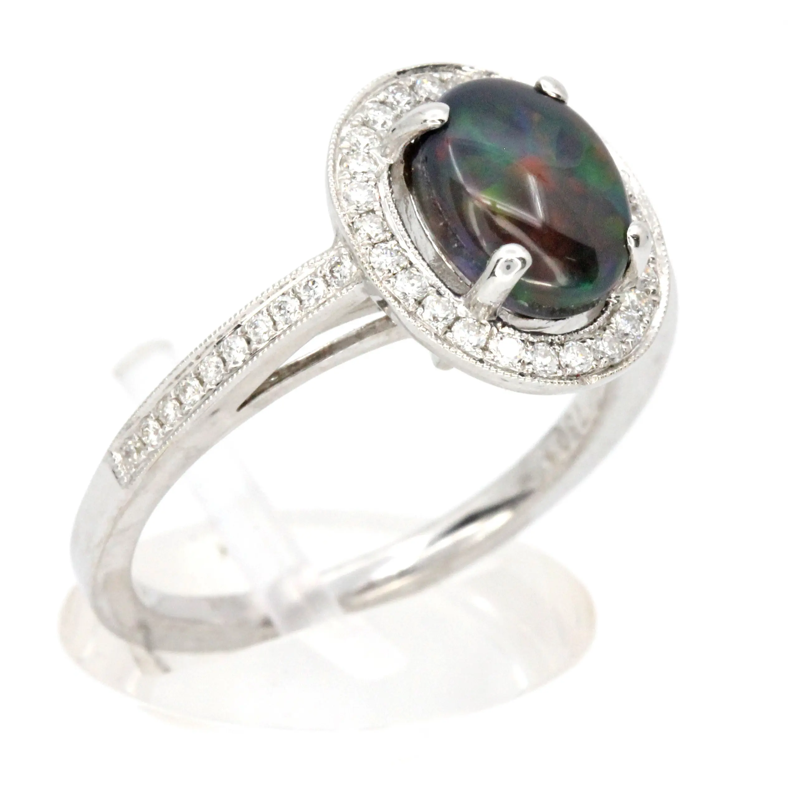 Oval Black Opal Ring with Halo of Diamonds set in 18ct White Gold