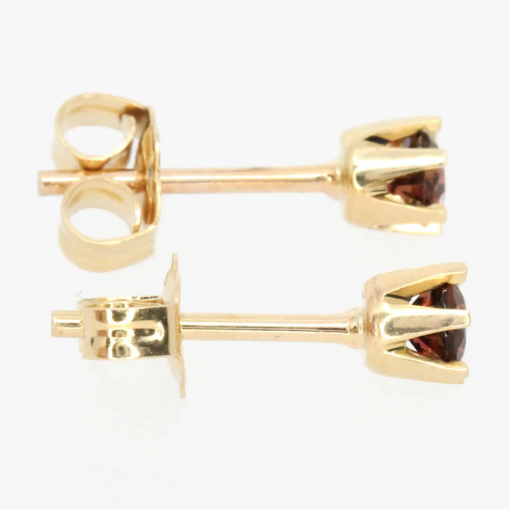 round cut garnet earrings