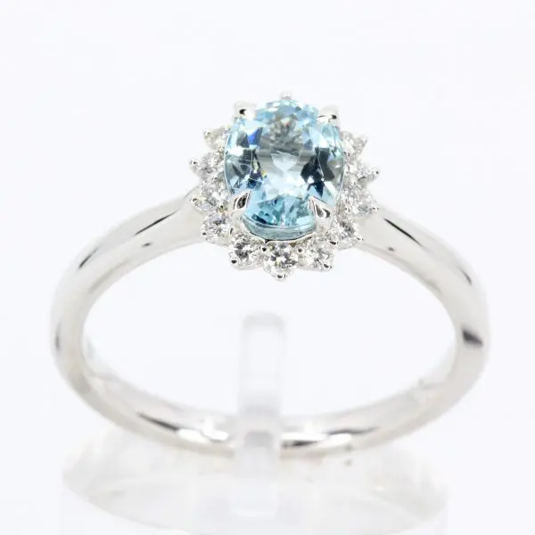 round cut emerald diamond ring