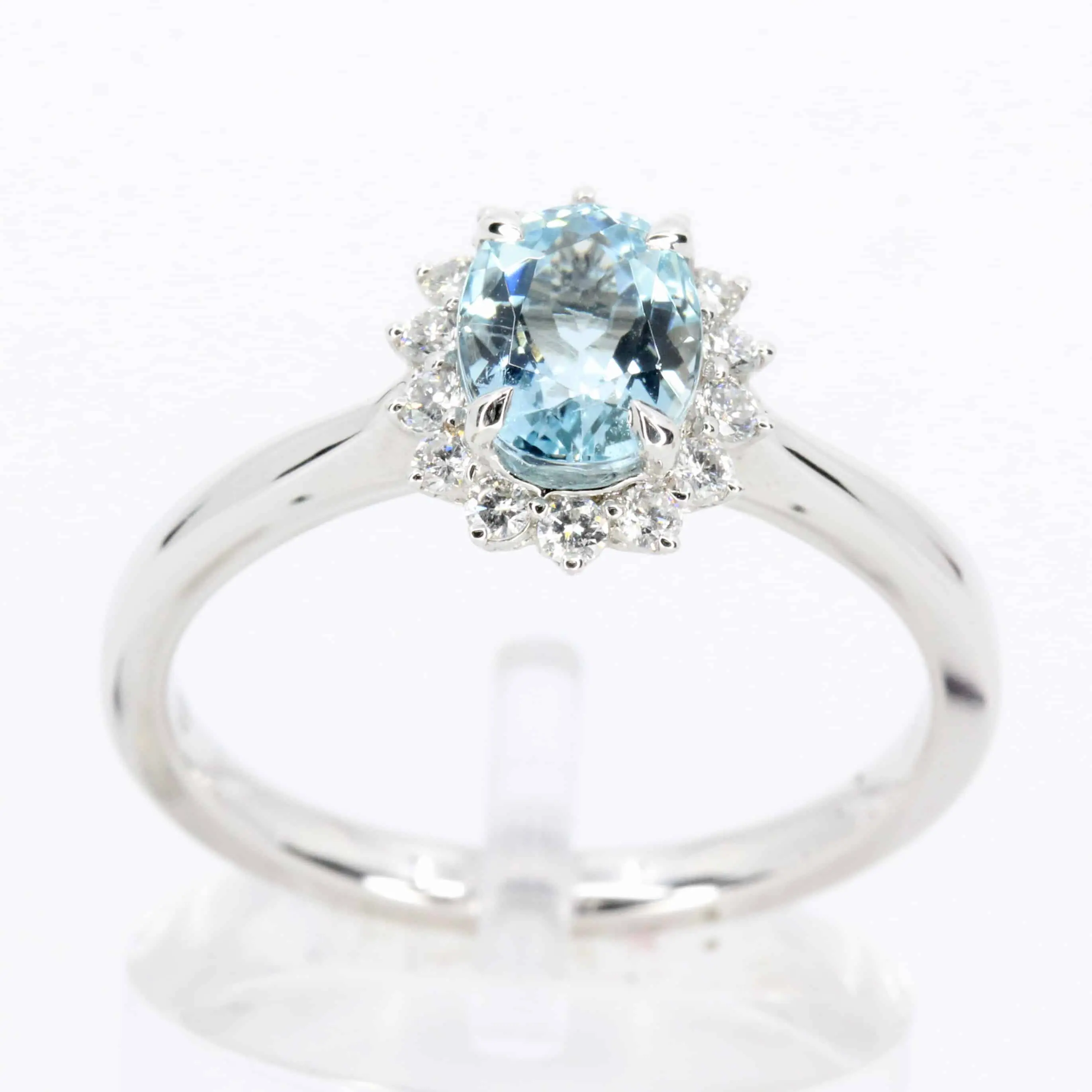 round cut emerald diamond ring