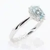 round cut emerald diamond ring