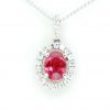 Oval Ruby Pendant with Halo of Diamonds set in 18ct Whte Gold