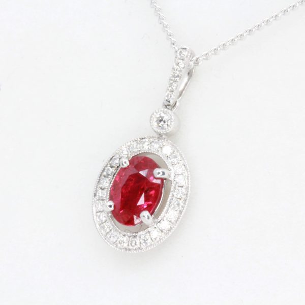 Oval Ruby Pendant with Halo of Diamonds set in 18ct White Gold