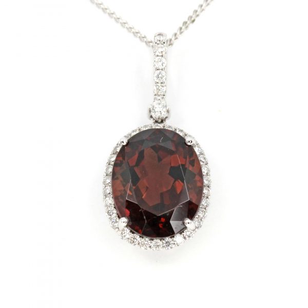 Oval Brown Tourmaline Pendant with Halo of Diamonds set in 18ct White Gold