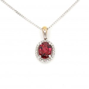 Oval Rhodolite Garnet Pendant with Halo of Diamonds set in 18ct White Gold & Yellow Gold