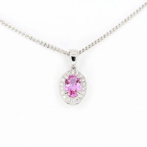 Oval Pink Sapphire Pendant with Halo of Diamonds set in 18ct White Gold