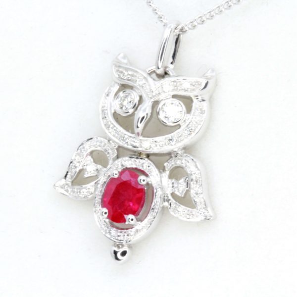 Oval Ruby Pendant with Halo of Diamonds set in 18ct White Gold