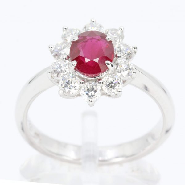 Oval Cut Ruby Ring with Diamond Halo Set in 18ct White Gold