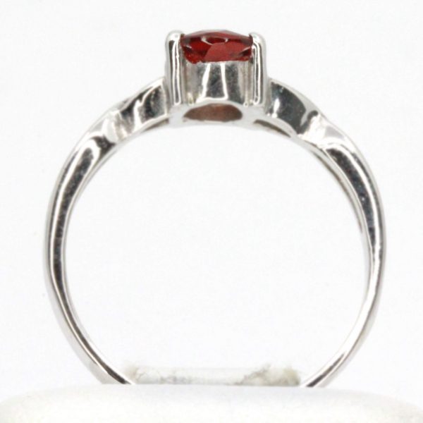 Garnet Solitaire Ring with Twisted Shoulders Set in 9ct White Gold
