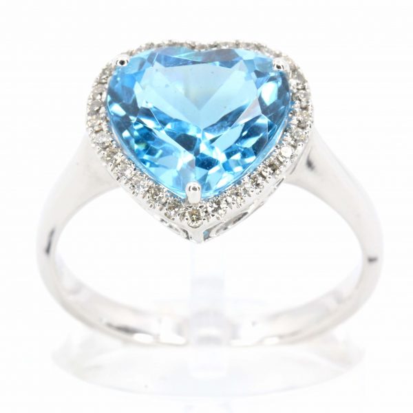 Heart Shape Blue Topaz Ring with Halo of Diamonds Set in 18ct White Gold
