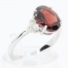 Oval Shape Garnet Ring with Accents of Diamonds Set in 18ct White Gold