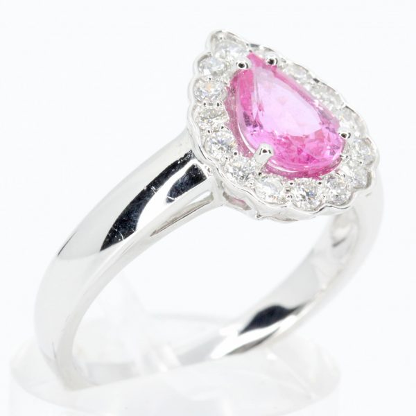 Pear Cut Pink Sapphire Ring with Scallop of Diamonds Set in 18ct White Gold