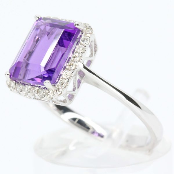 Emerald Cut Amethyst Ring with Halo of Diamonds Set in 18ct White Gold