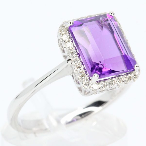 Emerald Cut Amethyst Ring with Halo of Diamonds Set in 18ct White Gold