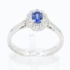 Oval Shape Sapphire Ring with Diamond Halo Set in 18ct White Gold