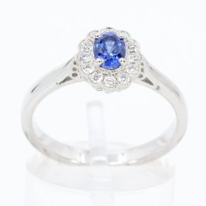 Oval Shape Sapphire Ring with Diamond Halo Set in 18ct White Gold
