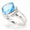 Cushion Cut Blue Topaz Ring with Accents of Diamonds Set in 18ct White Gold
