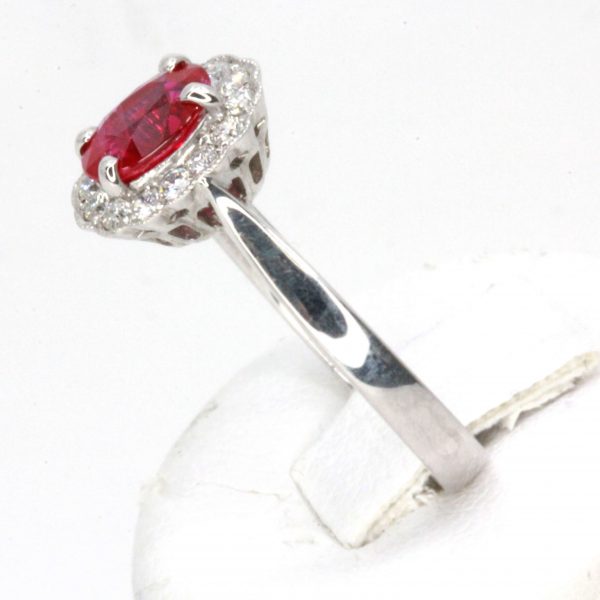 Oval Shape Ruby Ring with Halo of Diamonds Set in 18ct White Gold