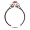 Oval Shape Ruby Ring with Halo of Diamonds Set in 18ct White Gold